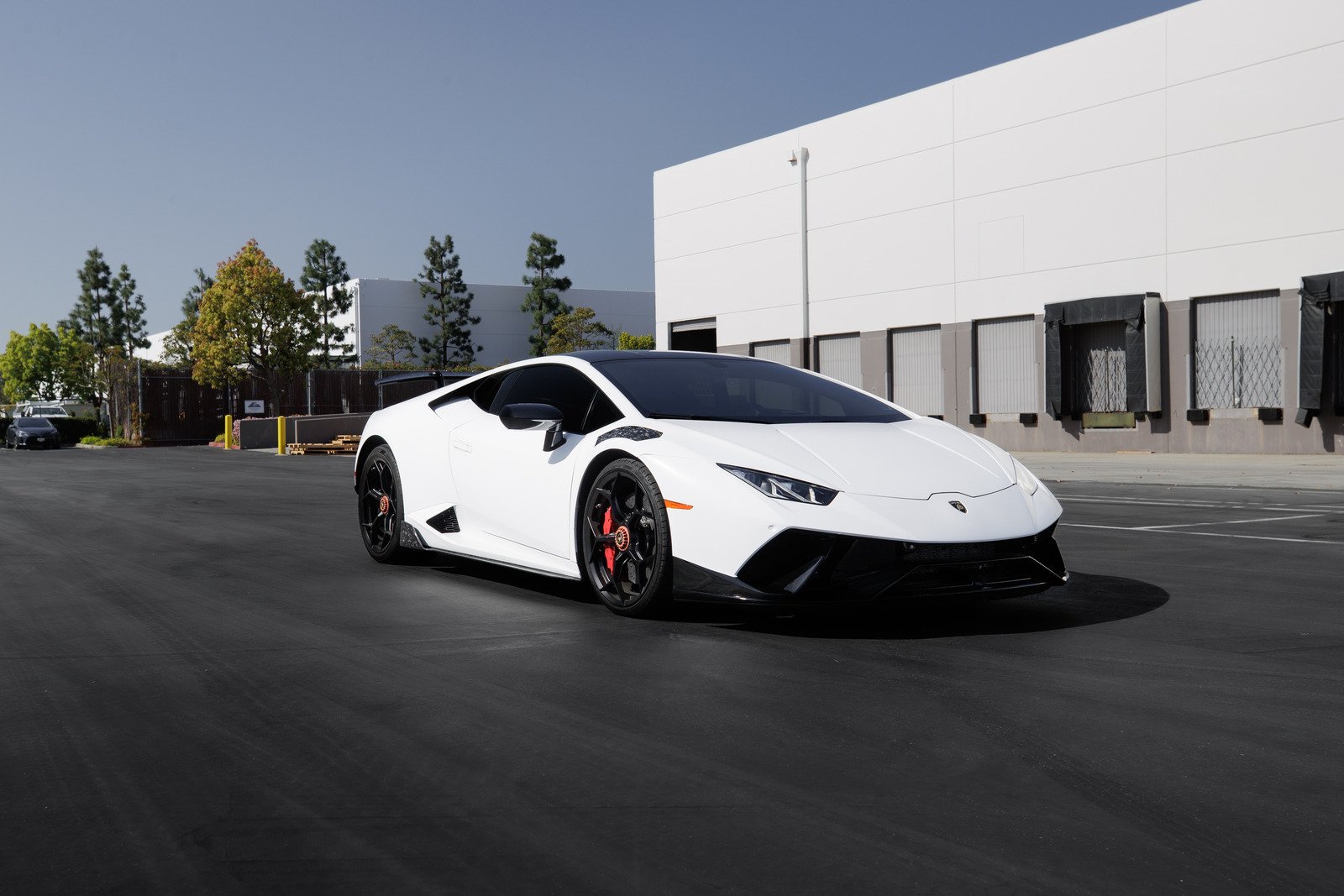 White sportscar Harboring Luxury Car Rental